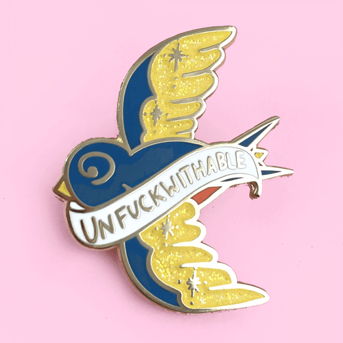 The Jubly-Umph - Unfuckwithable Lapel Pin represents an unwavering spirit that remains untouched by external negativities.