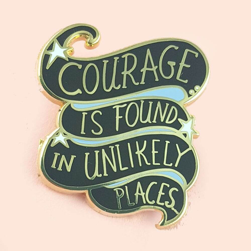Jubly-Umph - Courage Is Found In Unlikely Places Lapel Pin is a celebration of the power of the human spirit and that greatness can come from the most unexpected of places.