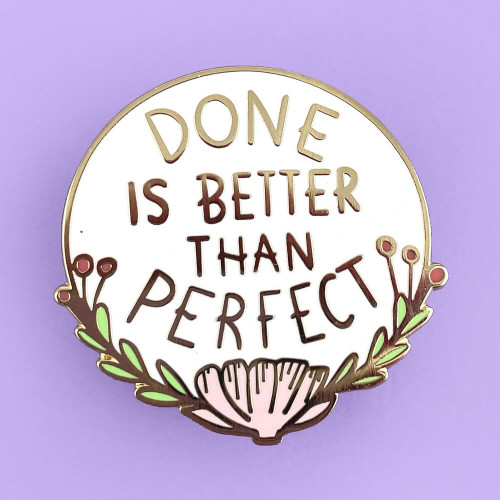 The JJubly-Umph - Done Is Better Than Perfect Lapel Pin is a visual reminder of a simple yet profound principle that can save us from unnecessary stress and burnout.