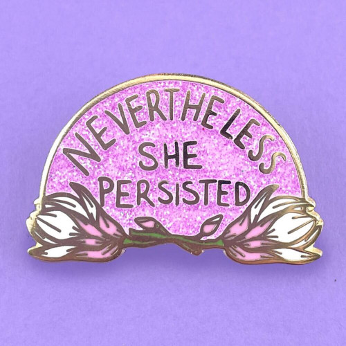 The Jubly-Umph - Nevertheless She Persisted Lapel Pin is a tribute to the strength, resilience, and determination of women who continue to make their voices heard.