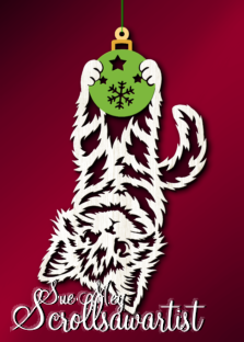 Upside down kitten and ornament