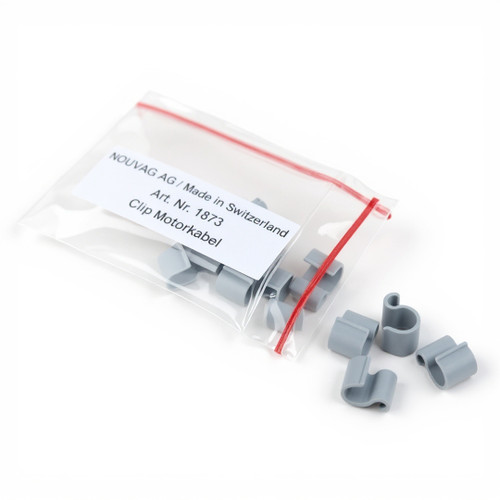 The 1873 Nouvag Motor Clip pack and its pieces are against a white background.