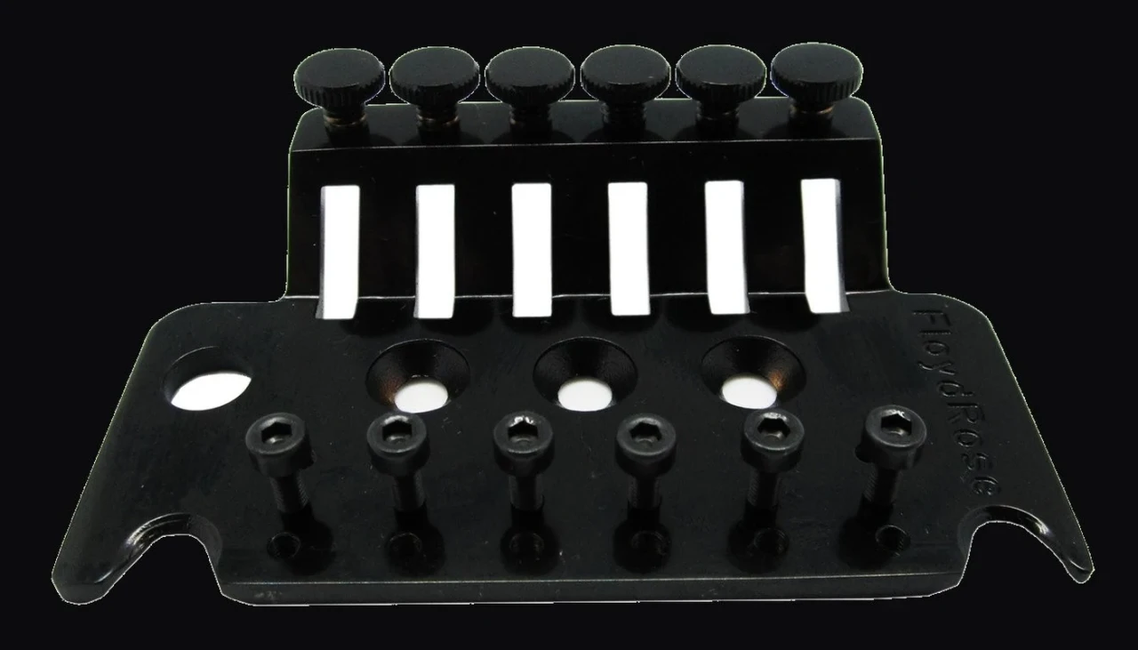 Floyd Rose tremolo base plate with saddles and fine tuners