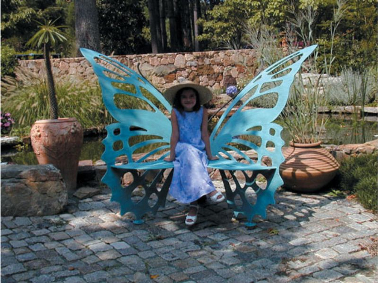 Metal butterfly 2025 chair garden art