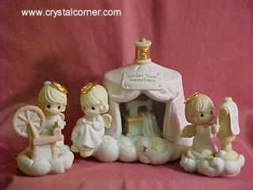 The Golden Town Seamstress Precious Moments