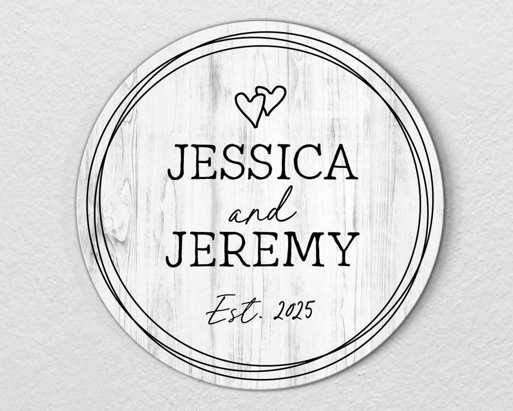 Rustic round wood family name wall sign personalized with a couple's first names and established year, ideal farmhouse home décor for newlyweds.
