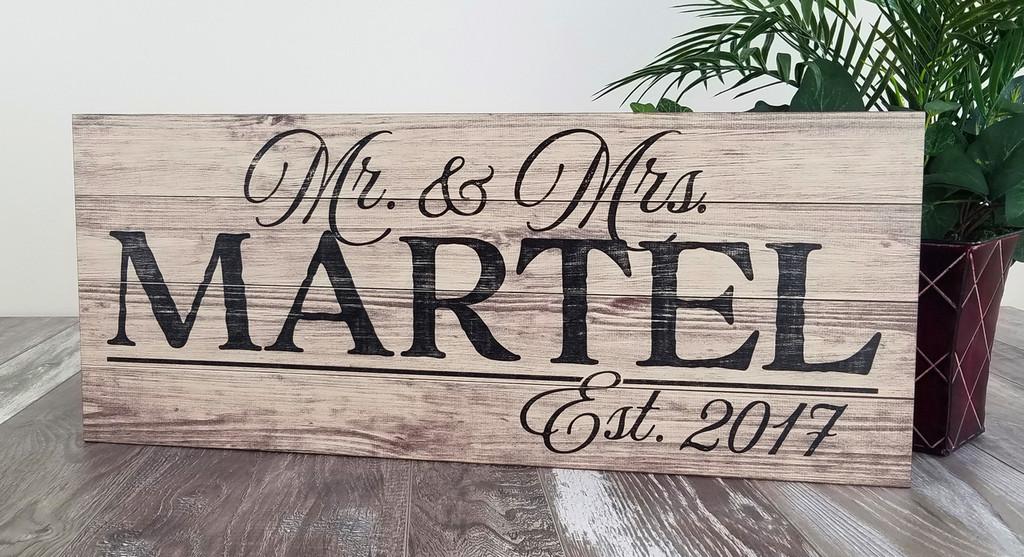 wooden family name sign