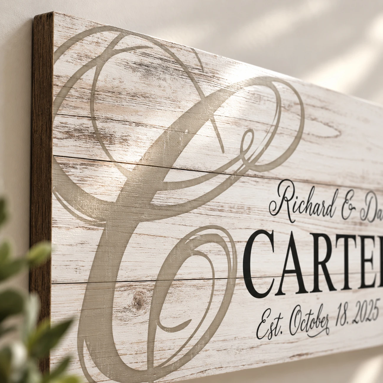 Close-up detail of a personalized family name sign printed directly onto wood
