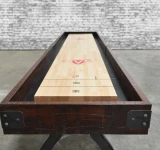 Venture Shuffleboard Williamsburg Shuffleboard Table, featuring a wooden playing surface with scoring sections and a dark wooden frame, made in USA.