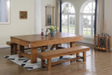 Playcraft Willow Bend Slate Pool Table with Dining Top Option and Free Play Kit, in a well-lit game room with large arched windows, wooden floors, and decor including a ball and cue rack, a flower vase, and a pool ball display.