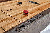 Brunswick Billiards Brunswick Soho Shuffleboard Table, close-up view showing the playing surface with shuffle pucks and score pins.