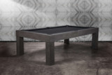 American Heritage Billiards Alta Pool Table in Marble Grey, a modern pool table with a sleek dark grey finish and a contemporary design, set against a patterned wall background.
