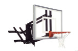 First Team Inc First Team ROOFMASTER Adjustable Basketball Hoop, a wall-mounted basketball hoop with an adjustable height mechanism and a white backboard, mounted on a metal frame with a red rim and net.