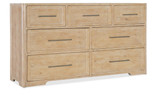Hooker Furniture Retreat Seven-Drawer Dresser, light wood finish with metal handles and six spacious drawers.