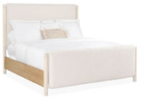 Hooker Furniture Retreat King Light Wood Upholstered Panel Bed, featuring a neutral upholstered headboard and footboard with light wood accents.