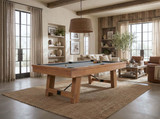 Isaac 8 ft slate pool table in Honey Ash by Plank and Hide styled in a modern farmhouse living room with wood beams, leather seating, and neutral decor