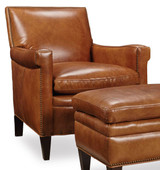 Hooker Furniture Nicolla Stationary Sofa, elegant brown leather armchair with nailhead trim and wooden legs.