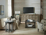 Hooker Furniture Sabi Sands Sling Chair, stylish and comfortable armchair with a unique, sling design and animal print upholstery in a cozy living room setting.