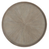 Hooker Furniture Affinity Round Cocktail Table, top view showing a round wooden table with a textured, radial grain pattern and a smooth rim.