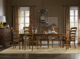 Hooker Furniture Tynecastle Buffet, a wooden dining room buffet with a dark finish, situated in a cozy room with large windows, beige curtains, and a decorative horse artwork in the background.