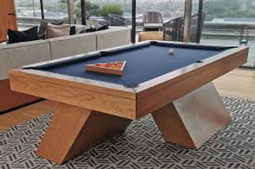 Entertaining in Style: The Role of Luxury Pool Tables in Upscale Home Décor