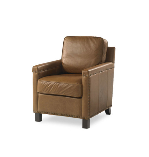 A thick light copper leather chair with short wooden legs A thick light copper leather chair with short wooden legs