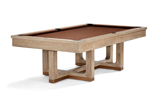 Hero 3/4 angle of the Brunswick Matanza Slate Pool Table, photographed to highlight its full silhouette, pedestal base, and Sandwash finish. This premium feature image captures the table’s strong presence and refined design—ideal for advertisements, landing pages, and first-look visuals. The warm tone of the finish, gold-bronze leg accents, and clean lines make it a striking focal point in any luxury game room setting.