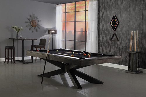 Plank & Hide Co Plank & Hide Felix Steel Slate Pool Table with a sleek black finish, placed in a modern living room with large window, pool cues, and decorative wall art.