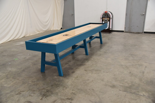 Venture Shuffleboard Mason Sport Shuffleboard Table by Venture, blue and wooden shuffleboard game table in indoor setting.