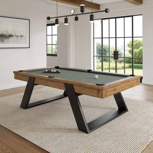 Plank & Hide Co Modesto Pool Table by Plank & Hide, Whiskey Finish, in a modern game room with large windows and natural lighting.