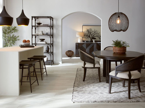 Hooker Furniture Retreat Pole Rattan Round Dark Wood Dining Table with 20-inch Leaf, in a modern dining room setting.