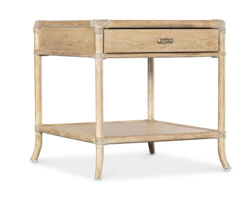 Hooker Furniture Retreat Pole Rattan Dune End Table, wooden end table with a natural finish, single drawer, lower shelf, and rope detailing on the corners.