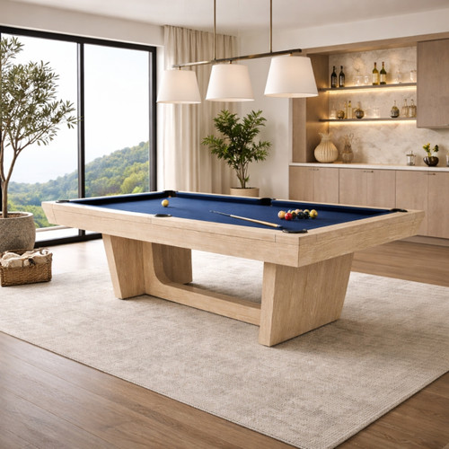 The Doc & Holliday Kaci 8-foot slate pool table features a Natural Ash wood finish, modern pedestal base design, and professional-grade slate playing surface. Designed for contemporary residential game rooms.