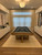 Brunswick Billiards Brunswick Matanza Slate Pool Table - Sandwash Finish, modern game room with pool table, neutral decor, and ambient lighting.