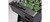 Brunswick Billiards Brunswick Corner Kick Foosball Table - Black & Silver Finish, close-up view showing the scoring rods, black and white players, green playing field, and control panel.