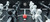 Brunswick Billiards Brunswick Premier Foosball Table, black and white foosball players with a red ball in the center.