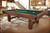 Brunswick Billiards Brunswick Canton Slate Pool Table, black forest and rustic grey finish, in a modern living room setting.