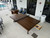 Plank & Hide Co Plank & Hide Harper Table Tennis Table with Storage Drawer, outdoor patio table tennis setup with a folding playing surface and a removable net on a balcony.