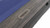 Plank & Hide Co Otis Weathered Grey Slate Pool Table, close-up of the pool table's weathered grey slate surface with a metal brand plate.