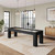 Plank & Hide Co Fulton Shuffleboard Table in Black Finish, modern black shuffleboard game table in a spacious living room with large windows and minimalist decor.