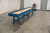 Venture Shuffleboard Mason Sport Shuffleboard Table by Venture, blue and wooden shuffleboard game table in indoor setting.
