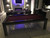 Playcraft Monaco Slate Pool Table & Dining Top – Gloss Black on Silver, modern pool table with a red playing surface in a stylish living room.