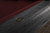 Playcraft Rio Grande Slate Pool Table, Weathered Raven Finish, close-up of the black wooden frame with the Playcraft logo emblem.