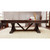 Playcraft Brazos River 8' Slate Pool Table with Weathered Black Finish, showcasing a dark, rustic wooden design with a sturdy base, set in a modern living room.