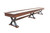 Playcraft Santa Fe Shuffleboard Table by Playcraft, Cocoa Bean finish, 12' to 16' sizes, showcasing a long, wooden shuffleboard table with black supporting legs and gameplay surfaces.