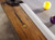 Isaac Pool Table in a Stressed Brulee Brown finish. Featuring brished golden metal turnbuckles. Isaac Pool Table in a Stressed Brulee Brown finish. Featuring brished golden metal turnbuckles.