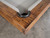 Plank & Hide Co Isaac Slate Pool Table by Plank & Hide, featuring a distressed brown and gold finish with wooden edges and a black felt playing surface.