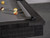 Plank & Hide Co Beaumont Pool Table by Plank & Hide with distressed black finish, featuring a close-up of the corner and cushions, billiard balls on the table.