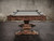 Plank & Hide Co Beaumont Pool Table, distressed brown wood with sleek modern design and sturdy pedestal base.