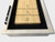Playcraft Montauk Shuffleboard Table by Playcraft, White Wash Finish, 9' & 12' - close-up image of the shuffleboard playing surface with score lines and cue.